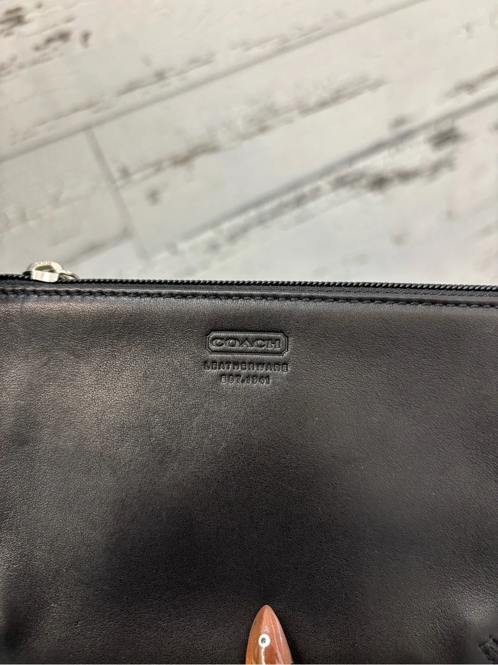 Coach Black Leather Drawstring Backpack with Silver Buckle